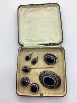 Lot 211 - A Victorian Bulls Eye Agate Oval Brooch,...