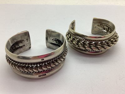 Lot 214 - An Egyptian Cuff Bangle, with ropetwist band...