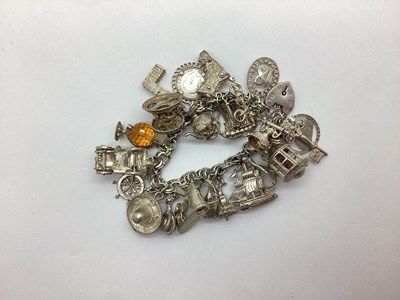 Lot 227 - A Hallmarked Silver Charm Bracelet with Heart...