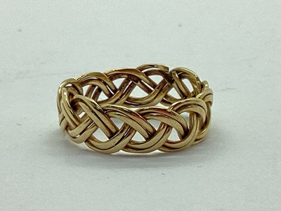 Lot 110 - A Vintage 9ct Gold Band, of weaved design...