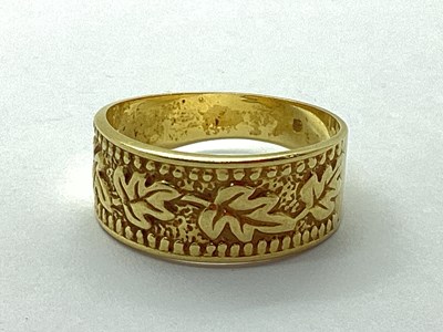 Lot 46 - A Decorative Tapered Band, with foliage and...