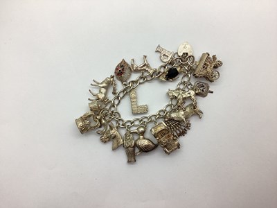 Lot 229 - A Vintage Hallmarked Silver Charm Bracelet,...