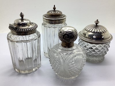 Lot 267 - A Collection of Hallmarked Silver Topped Jars,...