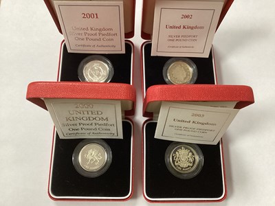 Lot 631 - Four Royal Mint Silver Proof Piedfort £1 Coins,...