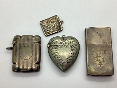 Lot 334 - A Hallmarked Silver Vesta Case, engine turned,...