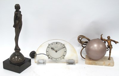 Lot 1417 - An Art Deco Style Lamp, with metal dancing...