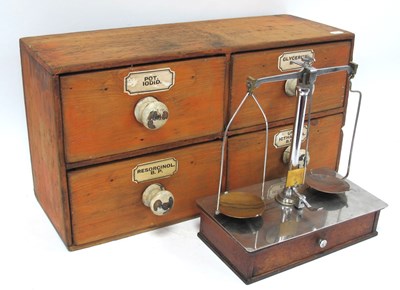 Lot 1453 - An Early 1900s Four-Drawer Pine Apothecary...