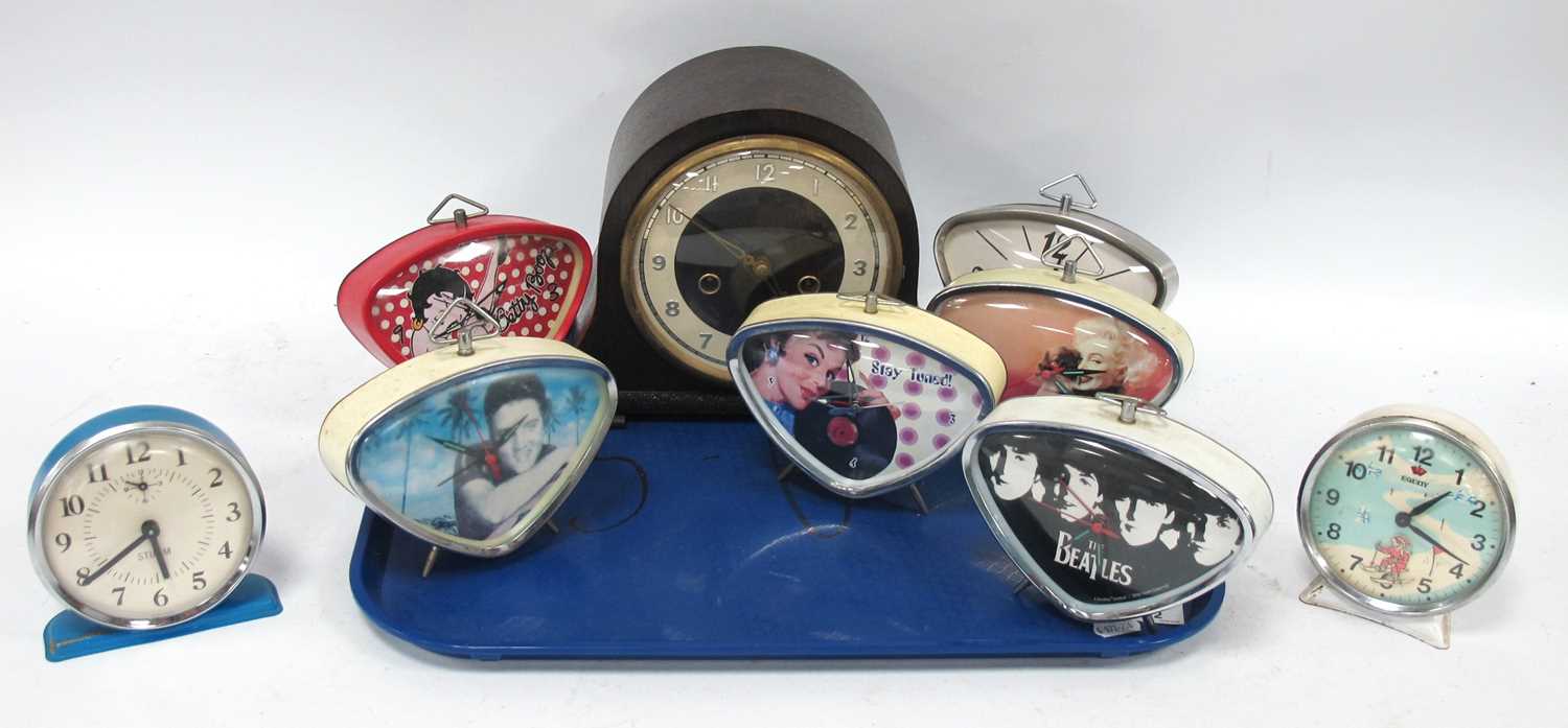 Lot 1472 - 1950s Style Triangular Cased Bedside Clocks...