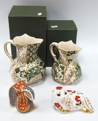 Lot 1258 - Royal Crown Derby Seal and Snail Paperweights,...