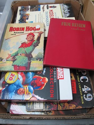 Lot 310 - A collection of books and annuals to include...