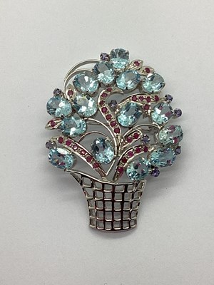 Lot 113 - A Modern Ruby Inset Flower Basket Brooch /...
