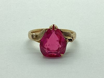 Lot 64 - A Single Stone Dress Ring, pear shape, claw...