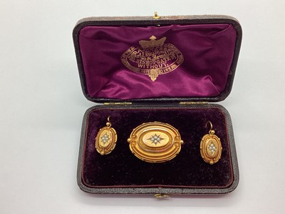 Lot 150 - A Victorian Seed Pearl Inset Oval Locket Back...