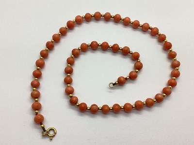 Lot 115 - A Coral Bead Necklace, alternate bead spacers,...