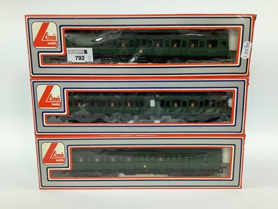 Lot 792 - An individually boxed Lima 00 gauge three-car...