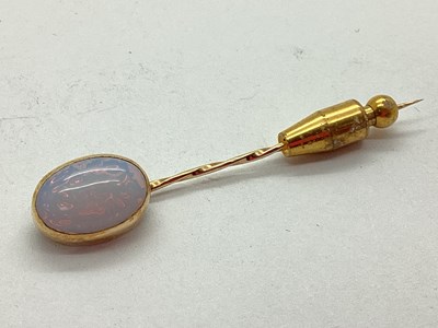 Lot 164 - A Opalite Glass Stick Pin, cabochon set. [638742]