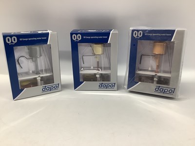 Lot 926 - Three Dapol 00 gauge motorised water towers...