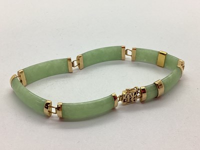 Lot 166 - A Jade Panel Style Bracelet, of curved design,...