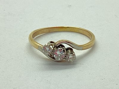 Lot 72 - A Three Stone Diamond Ring, of graduated...