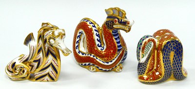 Lot 1072 - Three Royal Crown Derby Porcelain Paperweights,...