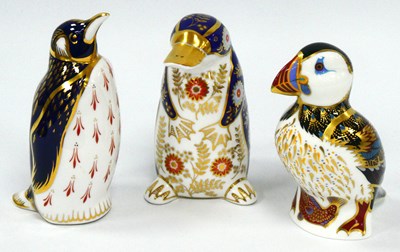 Lot 1068 - Three Royal Crown Derby Porcelain Paperweights,...