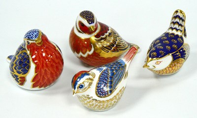Lot 1039 - Four Royal Crown Derby Porcelain Paperweights...