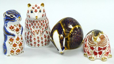 Lot 1071 - Four Royal Crown Derby Porcelain Paperweights,...