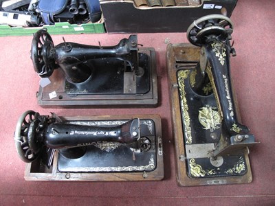 Lot 1091 - Three vintage Singer sewing machines...