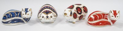 Lot 1180 - Four Royal Crown Derby Porcelain Paperweights,...