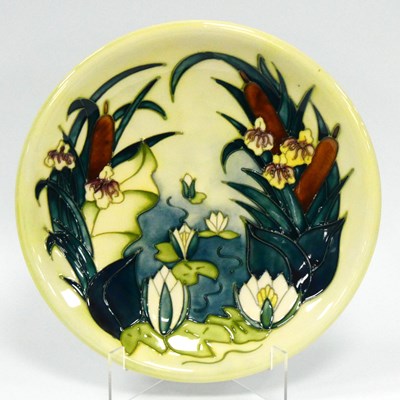 Lot 1062 - A Moorcroft Pottery Plate, painted in the...