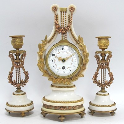 Lot 1551 - A Louis XVI Style White Marble and Ormolu...