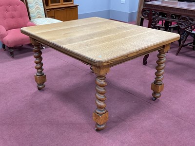 Lot 1584 - 1930s Oak Wind Out Table, on barley twist and...