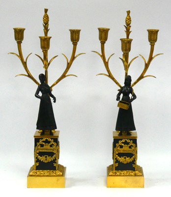 Lot 1333 - A Pair of French Gilt and Patinated Bronze...
