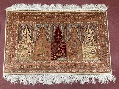 Lot 1474 - A Fine Rectangular Persian Silk Rug, with five...