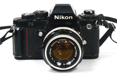 Lot 1373 - Nikon F3 SLR Camera, black, No. 1343766, with...