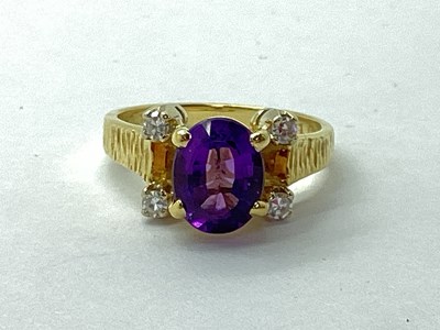 Lot 86 - A Modern 18ct Gold Amethyst and Diamond Dress...