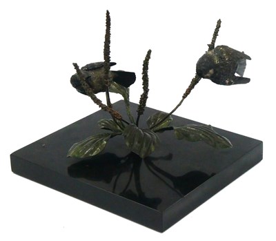 Lot 1322 - A Cast Metal Model of Two Small Birds Perched...