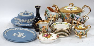 Lot 1187 - Wedgwood Jasper Ware, a pair of oval-shaped...