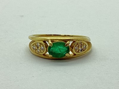 Lot 93 - A Modern Emerald Dress Ring, of openwork...