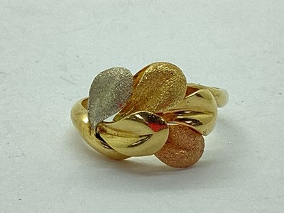 Lot 46 - A Modern Three Colour Dress Ring, of abstract...