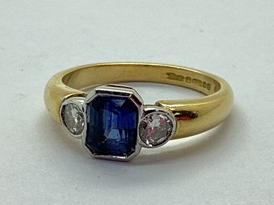 Lot 53 - A Modern 18ct Gold Sapphire and Diamond Three...