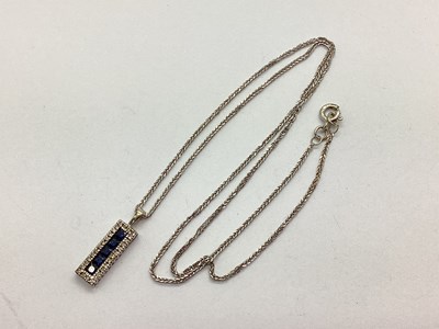 Lot 75 - A Modern 9ct White Gold Sapphire and Diamond...