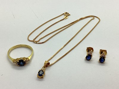 Lot 181 - A Modern Sapphire and Zircon Dress Ring, oval...