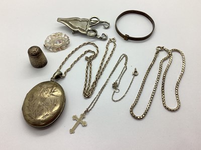Lot 107 - A Large Oval Locket Pendant, allover bird and...