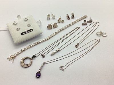 Lot 123 - A CZ Set Line Bracelet, of uniform design,...