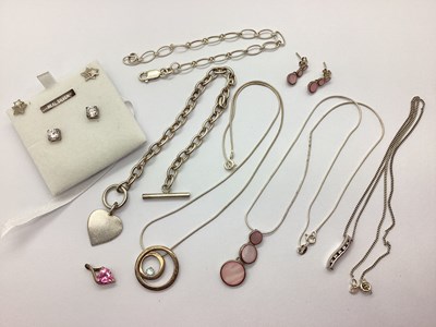 Lot 126 - A Modern CZ Set Pendant, on fine chain,...