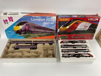 Lot 861 - Two OO Gauge Hornby Train Sets. #R1153 London...
