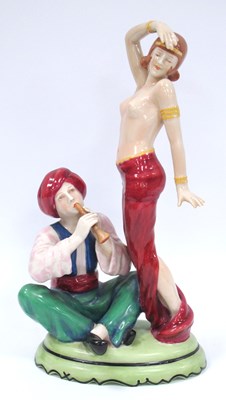 Lot 1146 - A Royal Dux Pottery Model of a Snake Charmer...