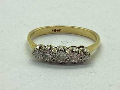 Lot 63 - A Five Stone Diamond Ring, graduated old cut...