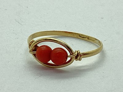 Lot 54 - An Unusual Coral Coloured Bead Dress Ring, of...